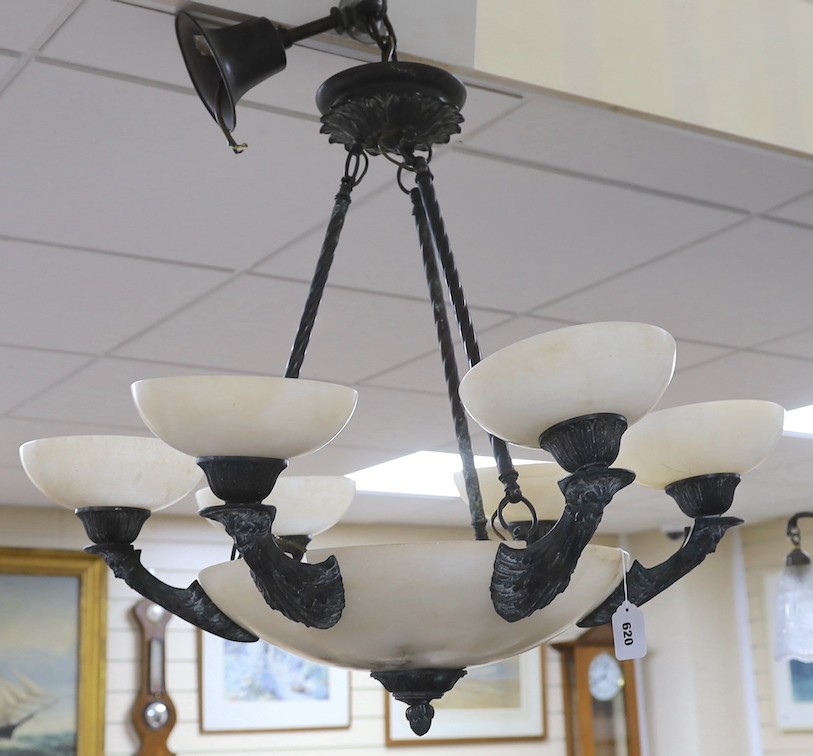 An Empire style bronze and an alabaster chandelier
